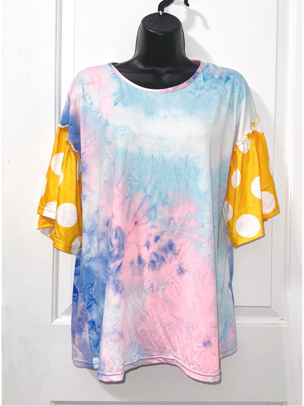 Southern Stitch boutique top in a multi- colored pastel pink and blue tie-dye
